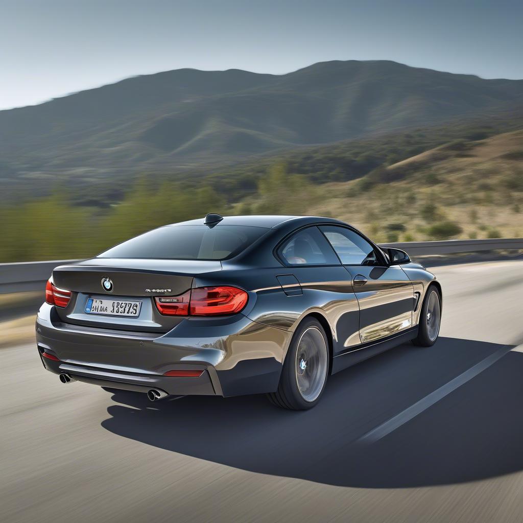 BMW 428i với bộ mâm thể thao di chuyển trên đường cao tốc