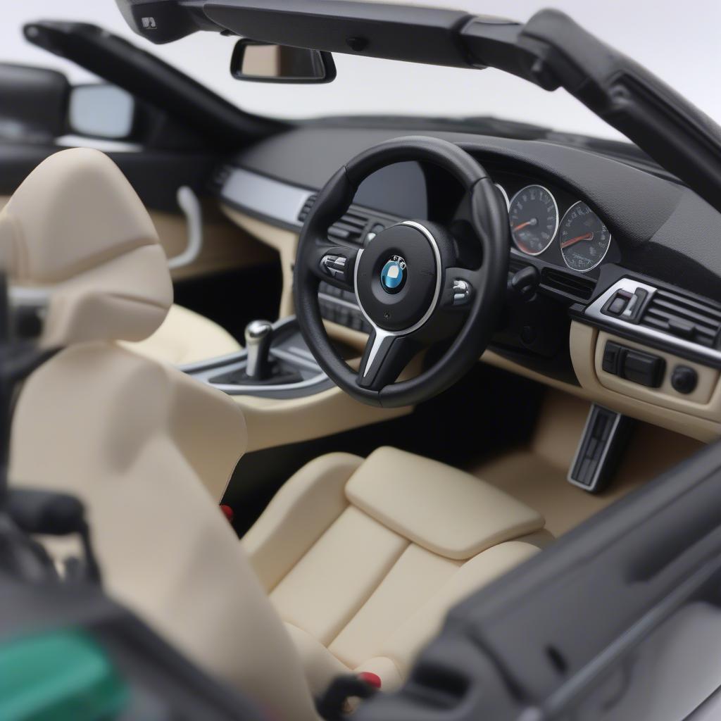 Mô hình BMW M3 Convertible Kyosho 1/18: nội thất được thiết kế tinh xảo, tái hiện chân thực không gian bên trong xe.