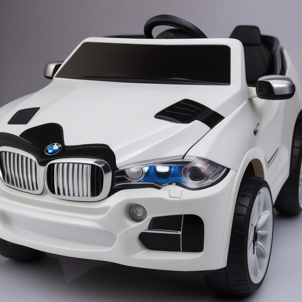 Xe điện BMW X5 cho trẻ em với thiết kế an toàn, màu sắc tươi sáng, nhiều tính năng giải trí.